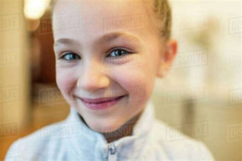 Portrait Of Smiling Girl Stock Photo Dissolve