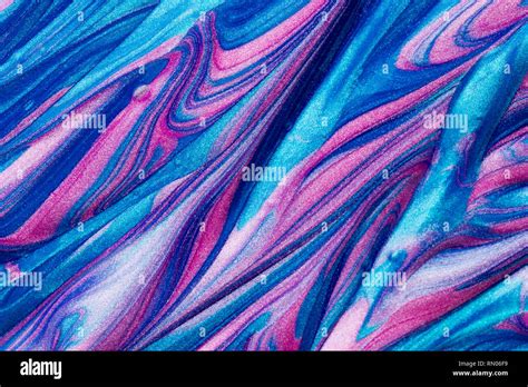 Abstract Textured Background Design Of Pink And Blue Metallic Glitter