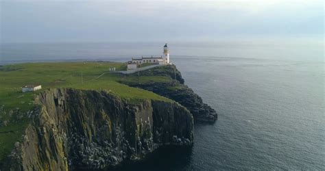 Browse 568 lighthouse at neist point stock photos and images available, or start a new. Neist Point Lighthouse And Coastal Cliffs Aerial View Stock Video Footage - Storyblocks
