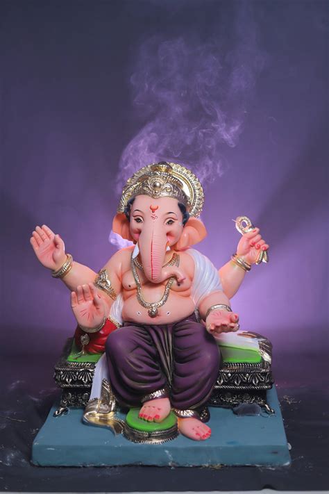 Download Smoking Incense For Ganesh Mobile Wallpaper | Wallpapers.com