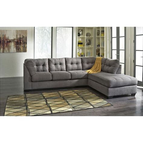 As you start browsing furniture, decorating and wall ideas for your room, think about the space's desired purpose and focus on a few staple items, such as a comfortable sofa and a coffee table, then choose the rest of the accent furniture and wall decor accordingly. 4520066 Ashley Furniture Maier - Charcoal Living Room Laf Sofa