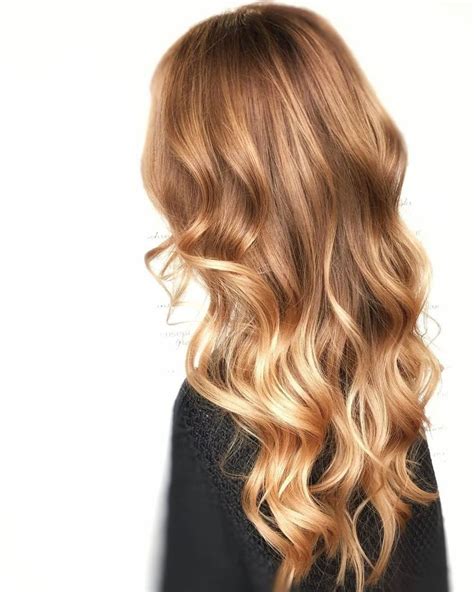25 Caramel Hair Colors Celebrity Colorists Are Seeing Everywhere Hair Color Caramel Caramel