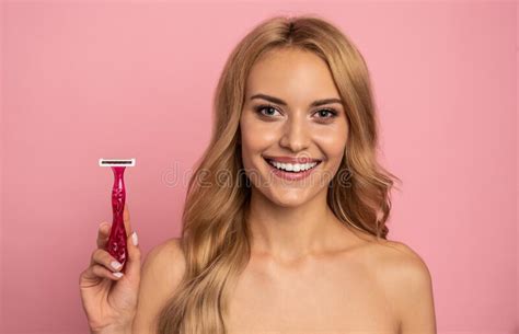 Image Of Adorable Half Naked Woman Smiling At Camera And Touching Her Face Isolated Over Pink