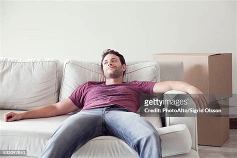 Men Sitting In Recliners Photos And Premium High Res Pictures Getty Images