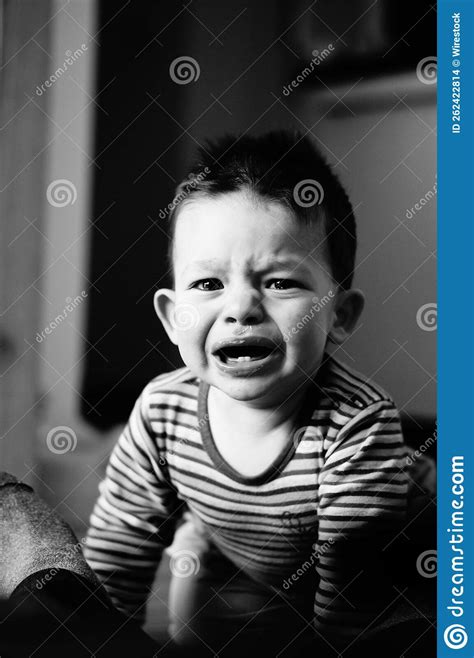Greyscale Portrait Of A Caucasian Little Cryingboy Stock Photo Image