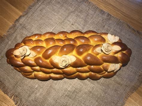 With your hands, roll each ball into a strand about 12 inches long and 1 1/2 inches wide. Gold awarded three tier braided bread | The Fresh Loaf