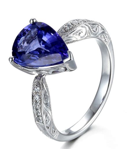 Unique 2 Carat Pear Shape Blue Sapphire And Diamond Antique Engagement
