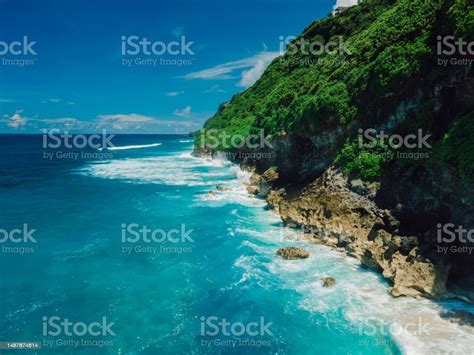 Tropical Landscape With Coastline And Turquoise Ocean In Bali Aerial