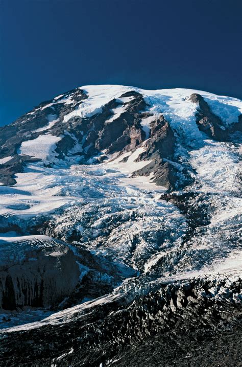 To get on a horse, bicycle, etc. Columbia Crest | summit, Mount Rainier, Washington, United ...
