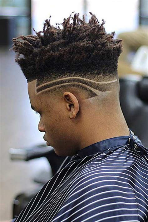 The taper fade on the back and sides keeps the hair short, while leaving a longer top. High Top Dreads #hightop #undercutdesign #dreadlocks # ...