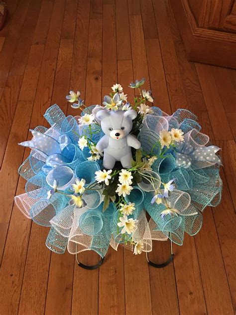 This style of funeral flower comes in the shape of an attractive arrangement and one that is suited both to the service and the home. Cemetery Flowers..Memorial Flowers..Cemetery Saddle..Baby ...