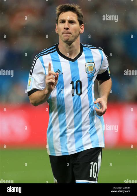 argentinas lionel messi celebrates scoring his penalty during the shootout hi res stock