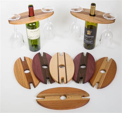 This is a smart design because it is harder to accidentally knock over a glass. wood wine glass holder over a wine bottle - Bing images ...