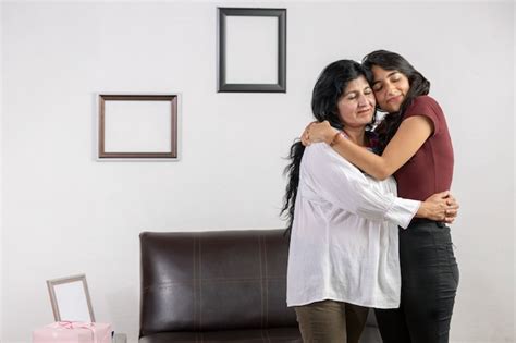 premium photo mexican mother and daughter hug on mother s day