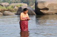 river bath indian woman taking india