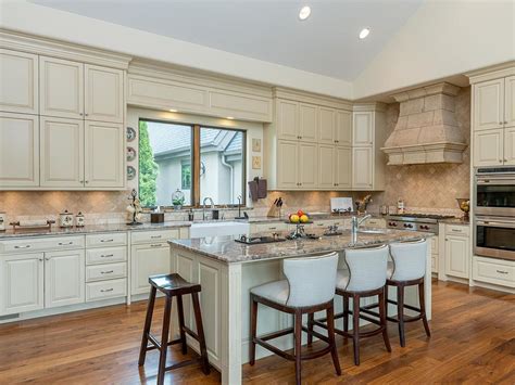 The kitchen backsplash is placed on the kitchen wall between the countertops and the wall cabinets. Kitchen Backsplash Gallery | Top 50 Pictures