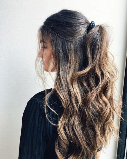 This wavy hairstyle is for the men with curly hair who are growing their curly hair out to be longer. Half Up Half Down Wavy Hair | Hair Color Ideas and Styles ...