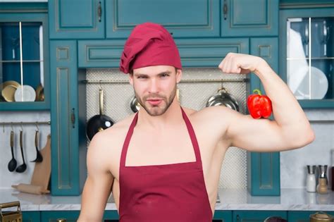 Premium Photo Man In Chef Hat Apron On Sexy Torso Flex Hand Muscles With Red Pepper In