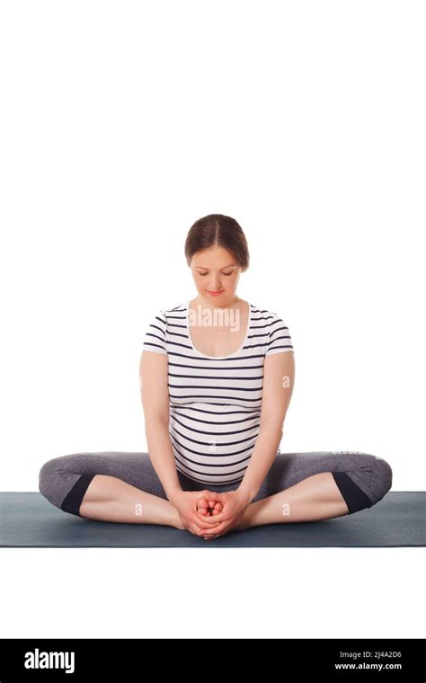 Pregnant Woman Doing Yoga Asana Baddha Konasana Stock Photo Alamy