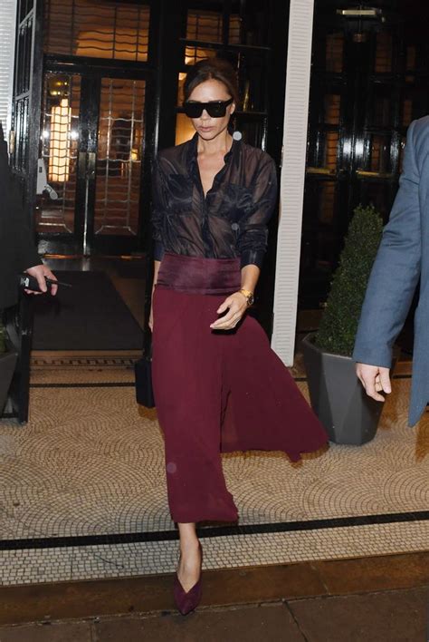 Victoria Beckham Turns Heads When She Appears To Go Braless Under Sheer Shirt As She Leaves