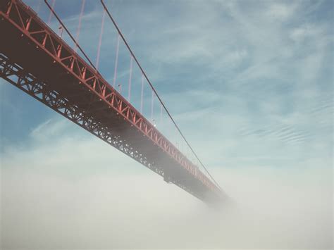 Golden Gate Bridge Disappears Into The Cloudy Fog Disappearing Golden