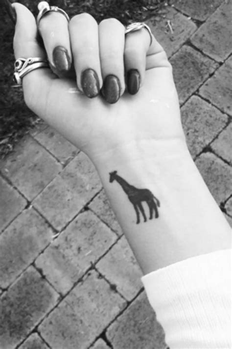 Small giraffe designs stand out from the rest because of the fact you can get it done on any part of your body. 30 Small Tattoos Every Girl Will LOVE | Giraffe tattoos ...