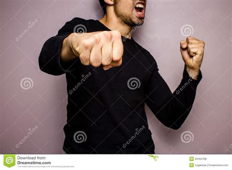 Angry Man Throwing A Punch Stock Photo Image Of Health 33184768