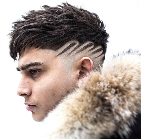 The Latest Trendy Haircuts For Men Include Line Hair Designs Shaved Shapes Spikes And Curly