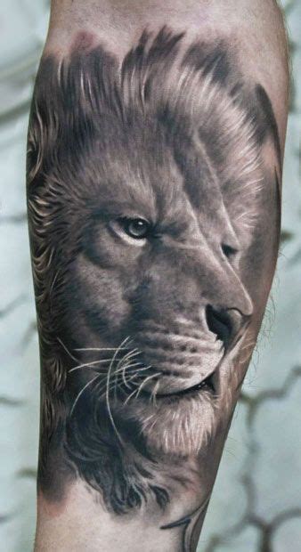 The lion is a popular tattoo design for men who want bold and masculine ink. Lion Tattoos for Men - Ideas and image gallery for guys