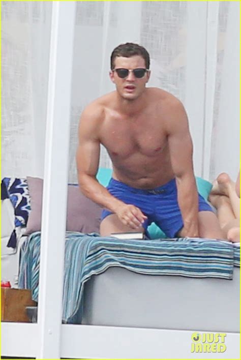 Shirtless Jamie Dornan Bikini Clad Dakota Johnson Film Fifty Shades Beach Scene Photo