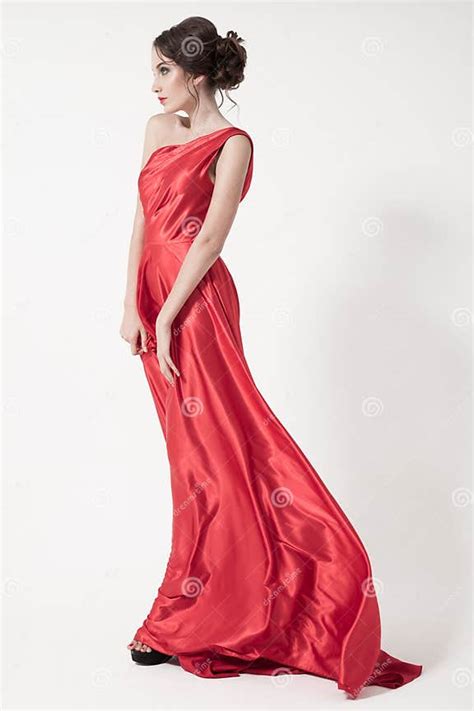 Young Beauty Woman In Fluttering Red Dress White Background Stock