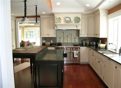 A butcher block countertop is a nice partner for modern, steel appliances. Kitchen Countertops With White Cabinets Ideas #152 ...