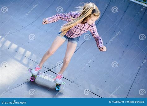Teenage Girl Trains On Skateboard In Skatepark Stock Image Image