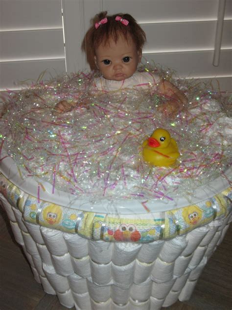 Safely bathe your little one in a baby bath tub or baby bath seat in the comfort of your kitchen sink if a bathtub is not available. Artsy Fartsy: Baby Shower Diaper gift...