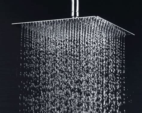 A Shower Head With Water Running Down It