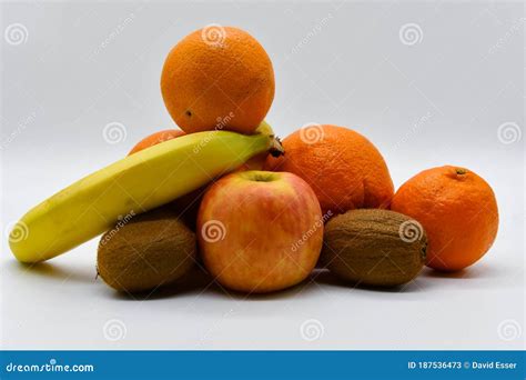 Kiwis Bananas Orange And An Apple Are All In A Heap Stock Image