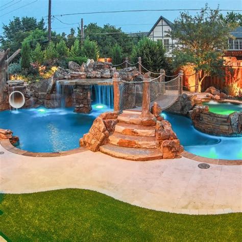 Tropical Backyard With Pool Suspended Bridge And Rope Swing Hgtv
