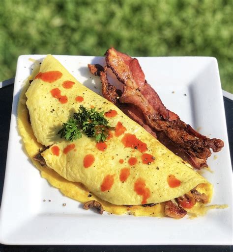 1,216 likes · 17 talking about this. Homemade Cherry tomato, mushroom, and bacon omelette : food