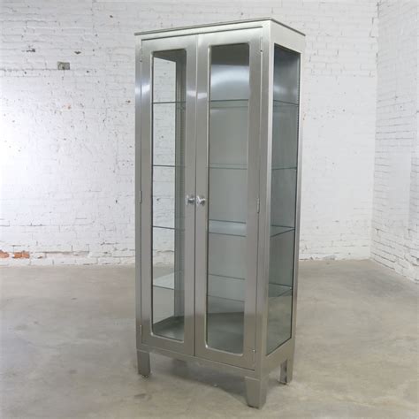 Vintage Stainless Steel Industrial Display Apothecary Medical Cabinet With Glass Doors And