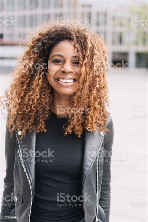 Happy Genuine Smiling Young African Woman Stock Photo Download Image