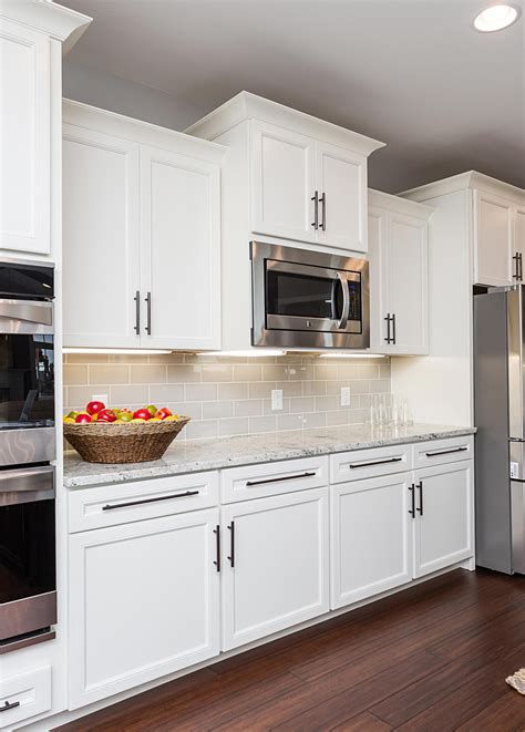 This Sophisticated Classic Off White Kitchen Features Belleair Maple