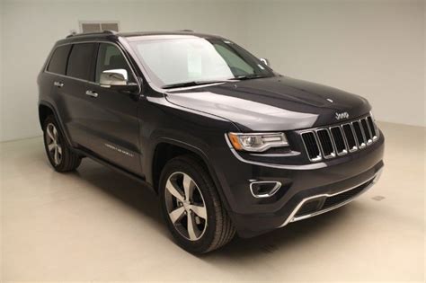 Engine type and required fuel. 2014 Jeep Grand Cherokee 3.6L V6 24v VVT Flex-Fuel Engine ...