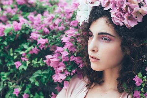 Woman Beauty Portrait With Pastel Pink Flowers By Stocksy Contributor