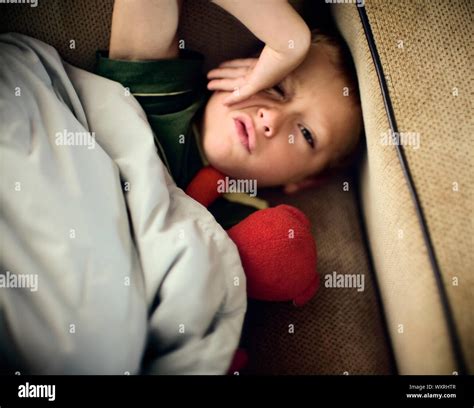 Boy Waking Up From A Nap Stock Photo Alamy