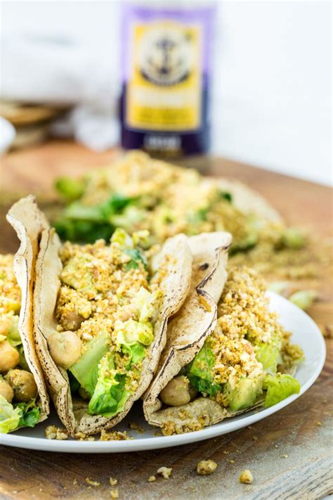 Parmesan cheese taco shells, garlic bacon and the easiest home made caesar salad ever! Chickpea Caesar Salad Tacos