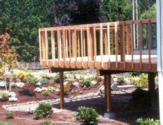 Then a 2x4 cap rail goes on top, discontinuous between the posts and attached with deck screws to the top. 2x4 rails, 2x2 baluster, 2x6 cap. | Deck, Decks and ...