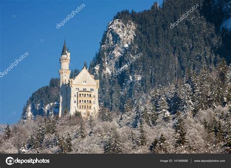 Snowy Bavarian Alps And Neuschwanstein Castle At Foggy Morning Stock