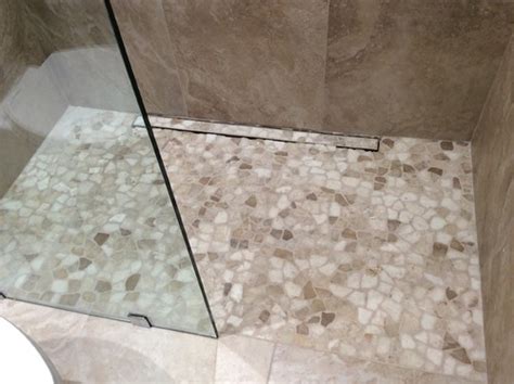 If you've got a concrete floor in need of an overhaul, installing epoxy flooring onto the concrete surface can be an ideal way to give it a new life. New stone shower floor - seal or not to seal?