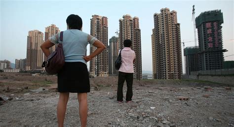 China Reels Under Debt Spending Hoped To Prevent Housing