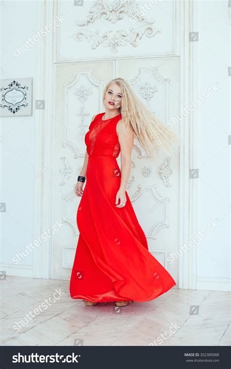 Young Beauty Woman Fluttering Red Dress Stock Photo 302389088
